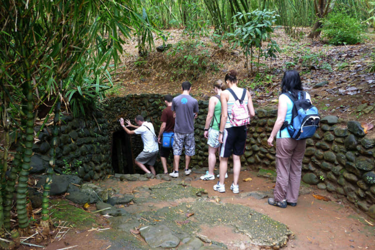 Tourists enter to visit the Cu Chi Tunnels