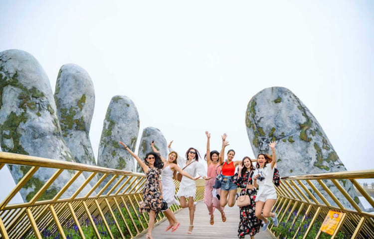 Visitors enjoy the warmth in Danang