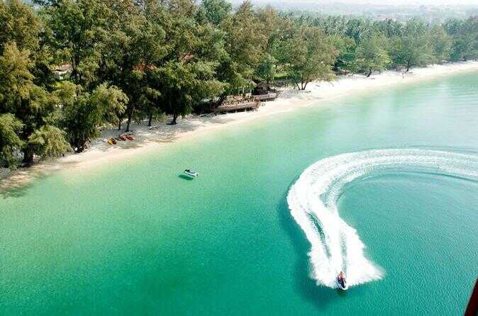 Visitors experience the windsurfers at Otres Beach, Sihanoukville