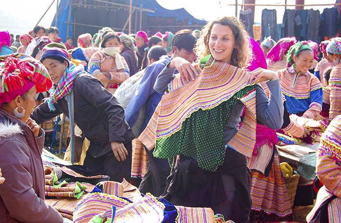 Colourfully dressed indigenous women of the Flower H'mong Ethnic Minority People at Bac Ha market.