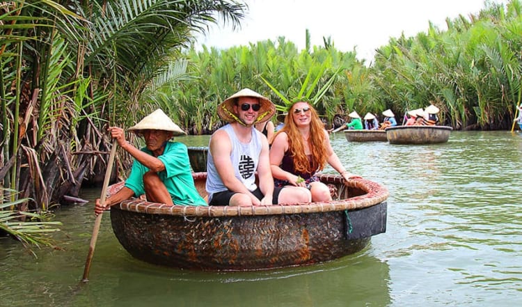 Going to Bay Mau coconut forest, you must experience going on a basket boat