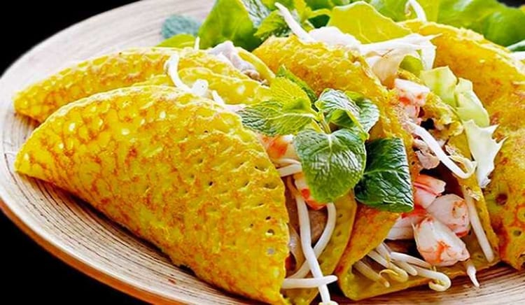 Banh xeo, or crispy Vietnamese pancake, is a prominent dish in Vietnamese cuisine.