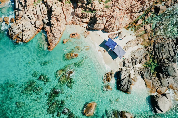 Coc Beach from a bird's eye view - experience the crystal-clear waters of the beach