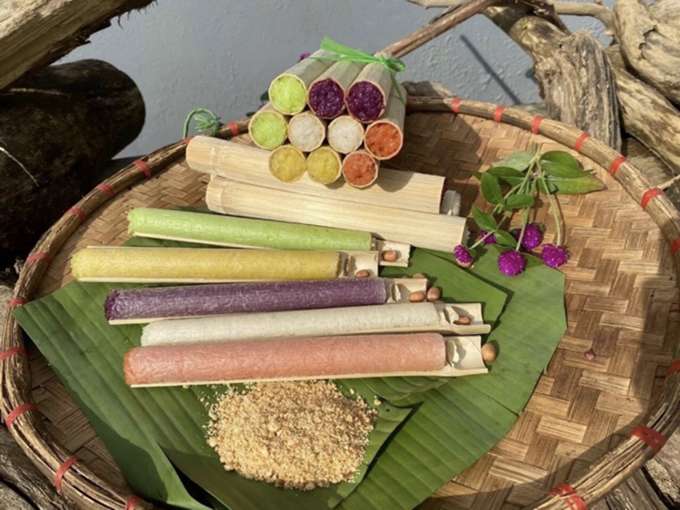 Embark on a culinary journey with Com Lam, sticky rice cooked inside bamboo tubes