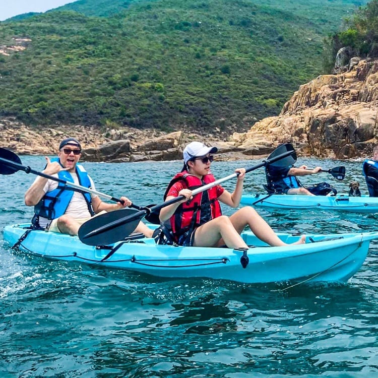 Kayak Vinh Hy Bay's crystal waters, spying on colorful coral reefs below.