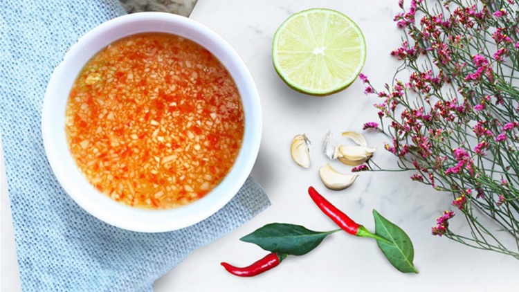 Nuoc mam, also known as fish sauce, is a cornerstone of Vietnamese cuisine, adding an umami-rich depth to dishes.