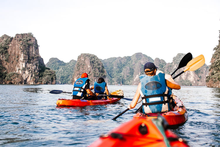 Kayaking in Ha Long Bay offers tourists a unique perspective of the natural wonder.