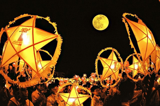 Children carrying lanterns in mid autumn festival